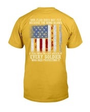 Load image into Gallery viewer, Our Flag Does Not Fly Because The Wind Blows Every Soldier T-Shirt
