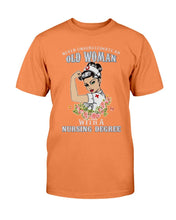 Load image into Gallery viewer, Never Underestimate An Old Woman With A Nursing Degree T-Shirt
