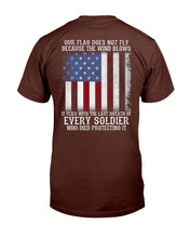 Load image into Gallery viewer, Our Flag Does Not Fly Because The Wind Blows Every Soldier T-Shirt
